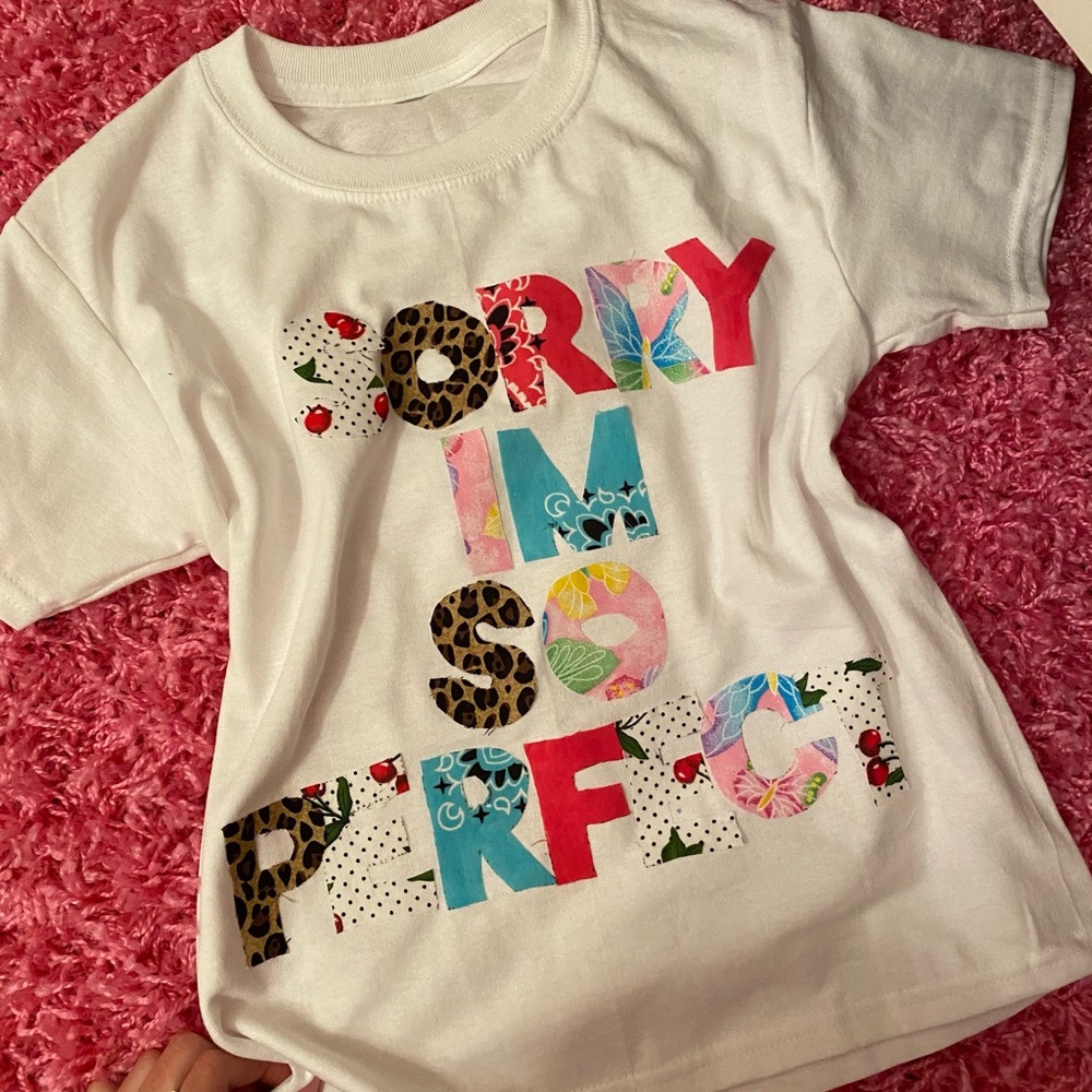 Sorry I’m so perfect baby tee